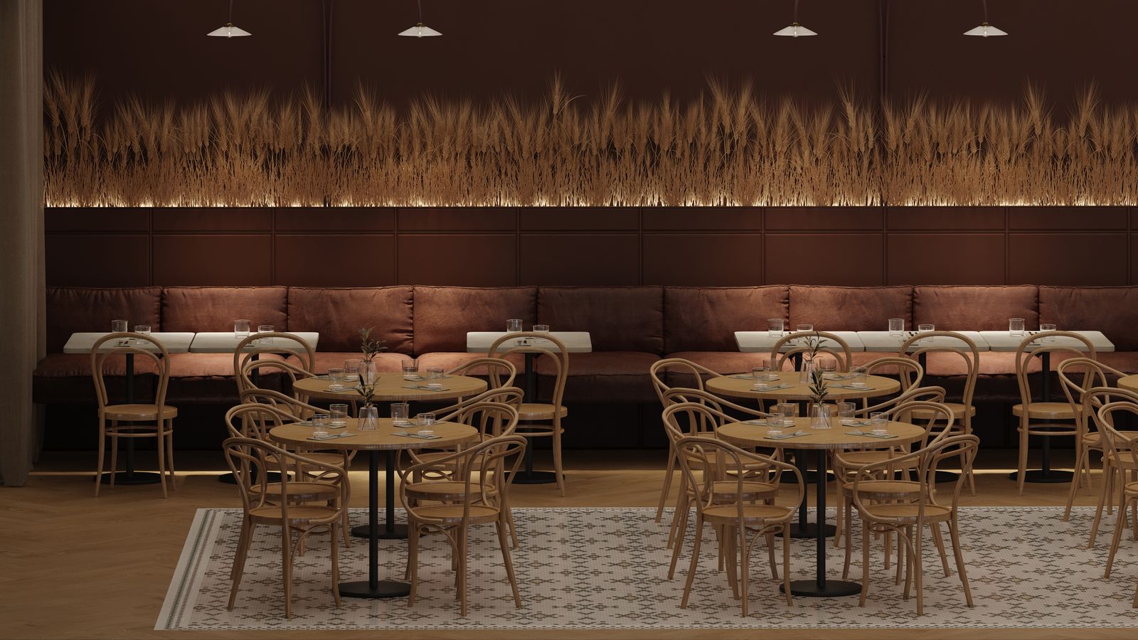 Banquette seating along the wall with dried grasses above